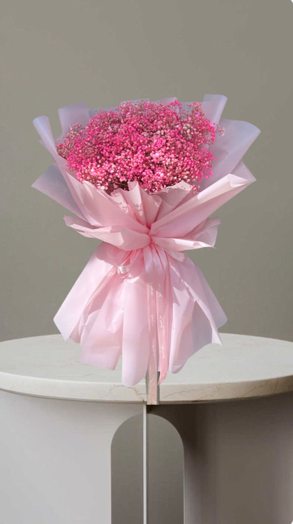 دسته گل ژیپسوفیلا صورتی شیک و خاص با کاغذپیچی صورتی مناسب هدیه عاشقانه و تبریک.خرید از گلفروشی فلورسا