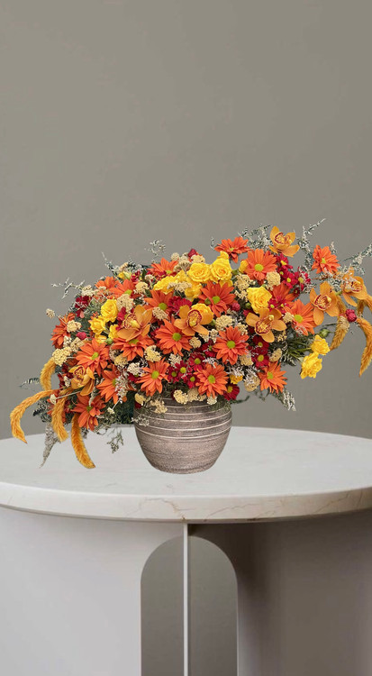 باکس گل با گل های نارنجی وزرد درگلدان سفالی دست ساز،مناسب پاییز،دکورمنزل و هدیه ای خاص-گلفروشی فلورسا